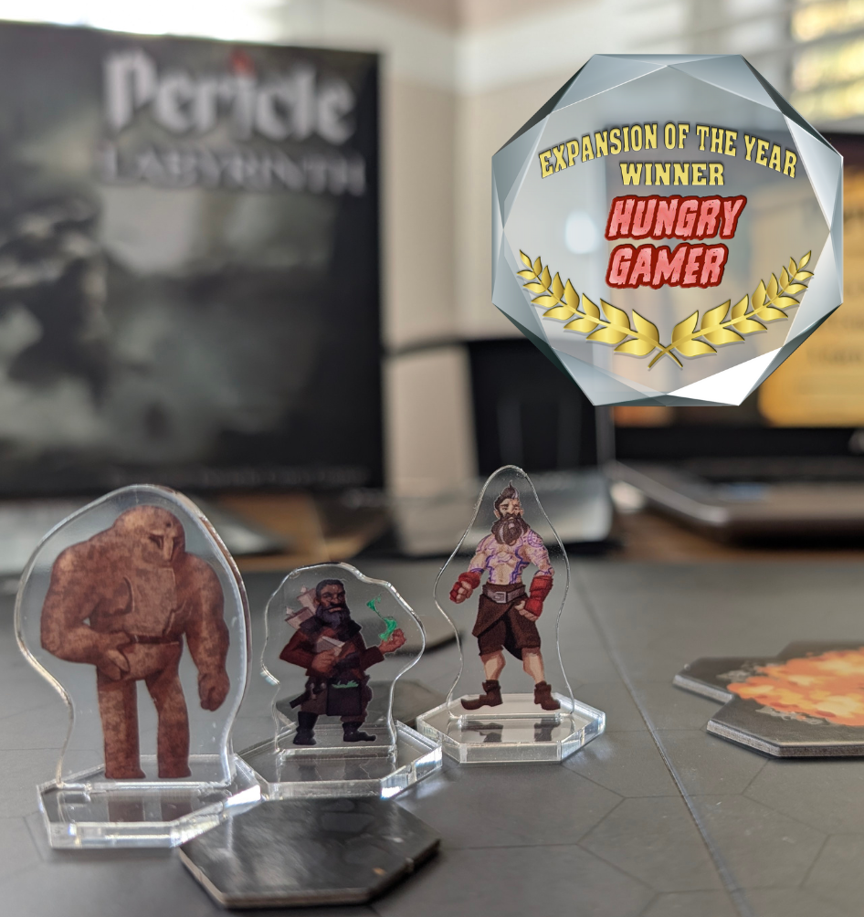 Game figures on stands with a 'Hungry Gamer' award in the background